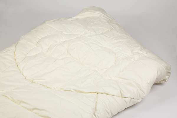 Schurwoll Bettdecke: Atmungsaktive Schurwolle für den Sommer